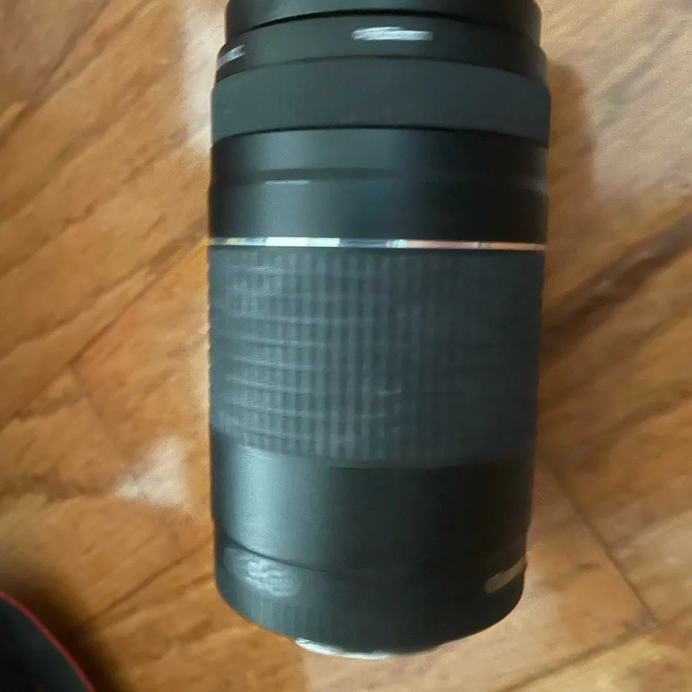 Canon Rebel Xsi DSLR camera with EF-S 18-55mm lens.